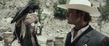 "THE LONE RANGER" L to R: Johnny Depp as Tonto and Armie Hammer as The Lone Ranger ©Disney Enterprises, Inc. and Jerry Bruckheimer Inc. All