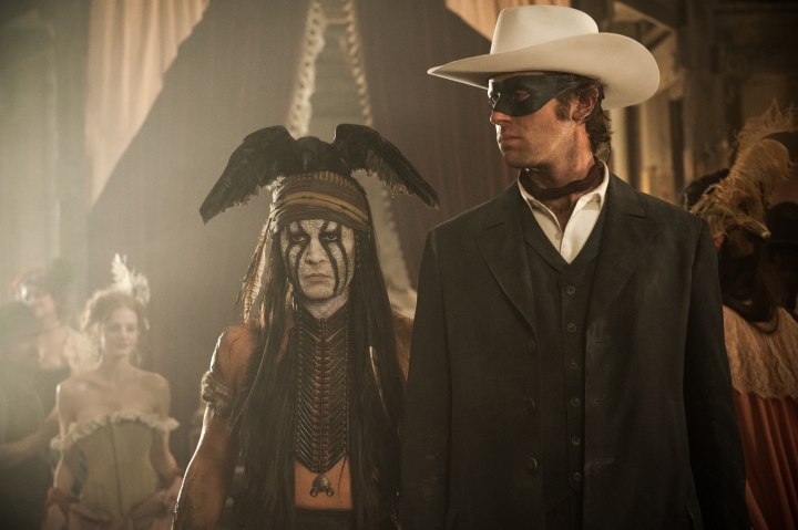 ©Disney Enterprises, Inc. and L to R: Johnny Depp as Tonto and Armie Hammer as The Lone Ranger Jerry Bruckheimer Inc.  All Rights Reserved.